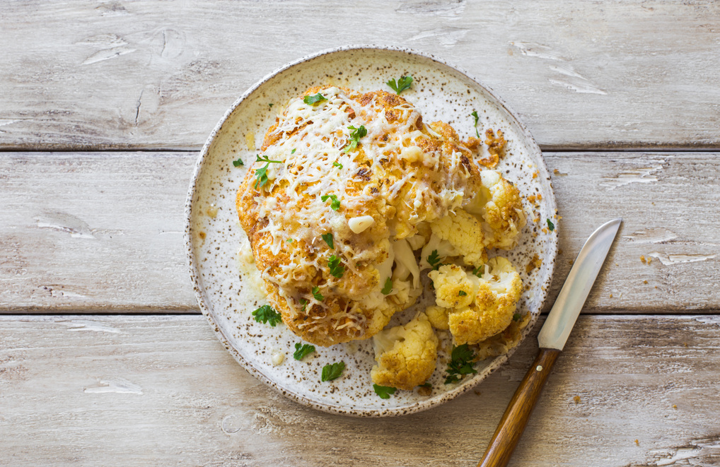Cauliflower baked in oven with parmesan cheese